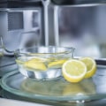 Is it better to clean microwave with lemon or vinegar?