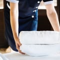 What is the difference between regular cleaning and deep cleaning in hotels?