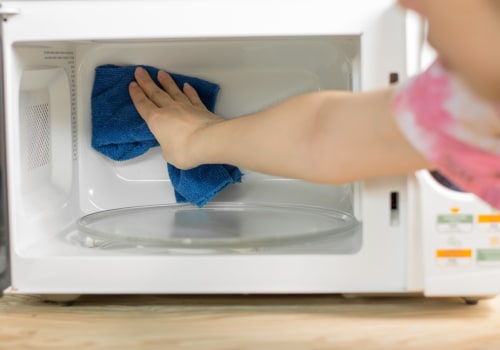 What is the best way to clean the inside of a microwave?